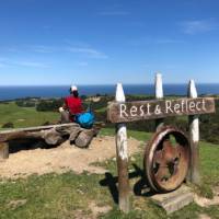 I think it's time to do what the sign says - taking a rest on the Kaikoura Coast Track |  <i>Angela Sexton</i>