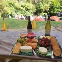 A campsite with drinks and snacks is camping New Zealand style