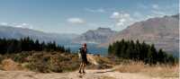 A walker enjoys the views and the solitude on the Queenstown Hills | QueenstownNZ.co.nz