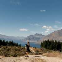 A walker enjoys the views and the solitude on the Queenstown Hills | QueenstownNZ.co.nz