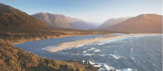 Aerial view over Long Reef and Martin's bay on the Fiordland, Hollyford and Stewart Island Trek | Hollyford Track