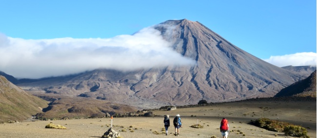 Walkers enjoying the barren lands of the Tongariro Alpine Crossing | David Tip